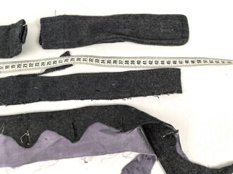 Konvolut Reste von einem Mantel der Luftwaffe.