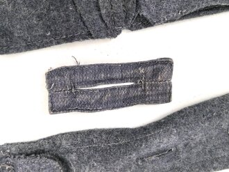 Konvolut Reste von einem Mantel der Luftwaffe.