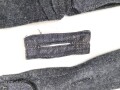 Konvolut Reste von einem Mantel der Luftwaffe.