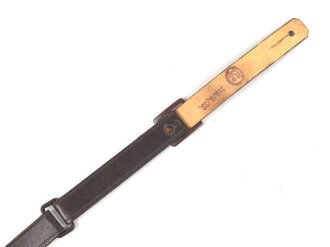Brauner Riemen aus Ersatzmaterial für eine Schaftmütze III.Reich. Ungereinigt. Gesamtlänge 33cm