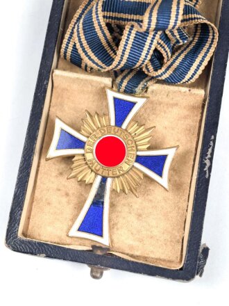 Ehrenkreuz der Deutschen Mutter in gold. Defektes Stück, am langen Band, im Verleihungsetui von Türk´s Witwe, Wien