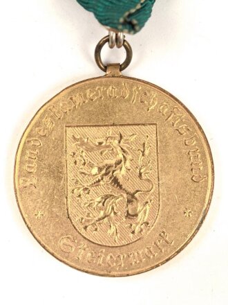 Österreich Mitgliedsabzeichen des Landeskameradschaftsbundes Steiermark in gold, an Dreiecksband