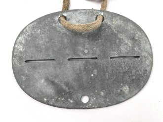 Erkennungsmarke Wehrmacht aus Zink " LDS. SCHTZ. ERS: KOMP. 4/17"  Deutlich getragenes Stück