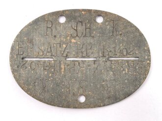 Erkennungsmarke Wehrmacht aus Zink " R. SCH. K. ERSATZ.KP. NR. 1403"