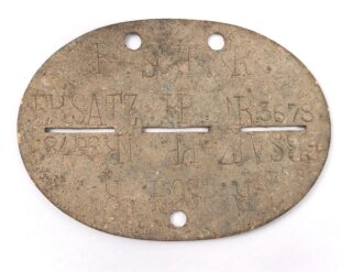 Erkennungsmarke Wehrmacht aus Zink " R. SCH. K. ERSATZ.KP. NR. 1403" ungereinigtes Stück