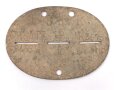 Erkennungsmarke Wehrmacht aus Zink " R. SCH. K. ERSATZ.KP. NR. 1403" ungereinigtes Stück
