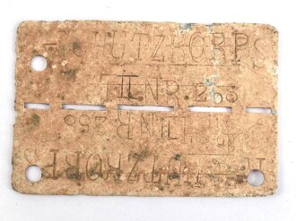 Erkennungsmarke  aus Zink " R.SCHUTZKORPS RST. I.. NR. 258"