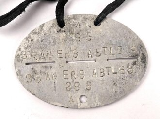 Erkennungsmarke aus Aluminium " 3 San. Ers. Abtlg. 5 " 3. Sanitäts Ersatz Abteilung 5,  getragenes Stück
