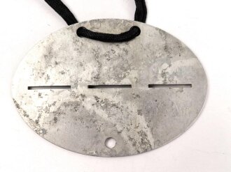 Erkennungsmarke aus Aluminium " 3 San. Ers. Abtlg. 5 " 3. Sanitäts Ersatz Abteilung 5,  getragenes Stück