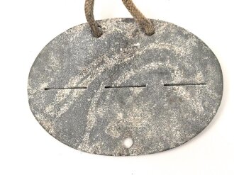 Erkennungsmarke aus Zink " Fliegerhorst Kommandantur A. 203/ XI""