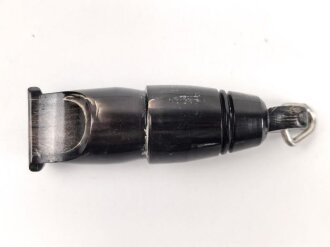 Trillerpfeife aus dunkelbrauner Preßmasse, guter Zustand