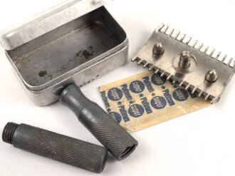 Zerlegbarer Metallrasierer in Aluminiumkästchen