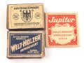 Drei Stück Zündholzverpackungen, meist leer