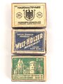 Drei Stück Zündholzverpackungen, meist leer