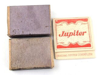 Drei Stück Zündholzverpackungen, meist leer