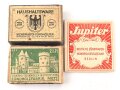 Drei Stück Zündholzverpackungen, meist leer