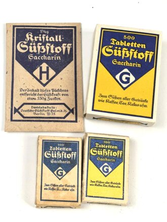 Vier verschiedene Päckchen Süßstoff...