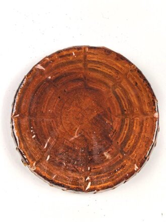 Halber Inhalt einer  Scho-ka-kola Dose Wehrmacht