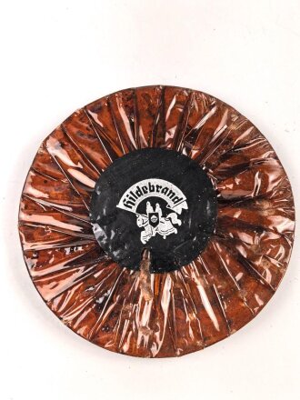 Halber Inhalt einer  Scho-ka-kola Dose Wehrmacht