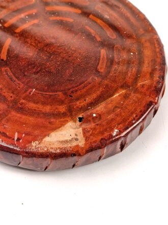 Halber Inhalt einer  Scho-ka-kola Dose Wehrmacht