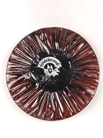 Halber Inhalt einer  Scho-ka-kola Dose Wehrmacht