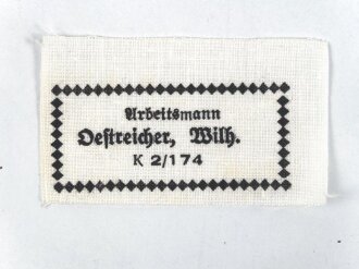 Reichsarbeitsdienst, Wäscheetikett für einen Arbeitsmann, ca. 3,5 x 6 cm, Textil