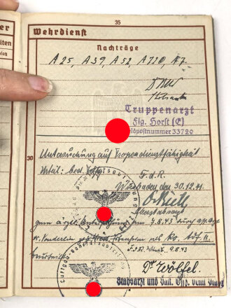 Wehrpaß Heer, eingestellt am  15.3.37 bei Sanitätsstaffel Detmold.