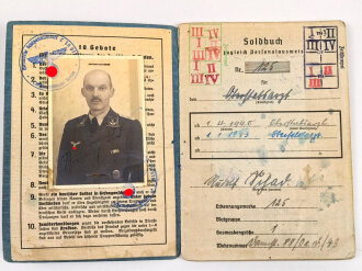 Wehrpaß Heer, eingestellt am  15.3.37 bei Sanitätsstaffel Detmold.