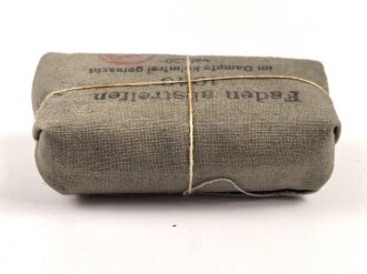 Verbandpäckchen Wehrmacht für den Verbandkasten und die Verbandspäckchentasche der Feldbluse. Kleines Modell datiert 1940