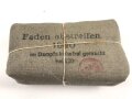 Verbandpäckchen Wehrmacht für den Verbandkasten und die Verbandspäckchentasche der Feldbluse. Kleines Modell datiert 1940