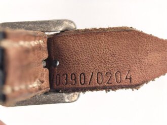 Stahlhelm Kinnriemen Wehrmacht, neuzeitliche Fertigung. Ungereinigt