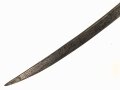 Klinge für einen Säbel, Länge 79cm, Gesamtlänge 97cm,  Breite 33mm. Alter und Herkunft unbekannt.