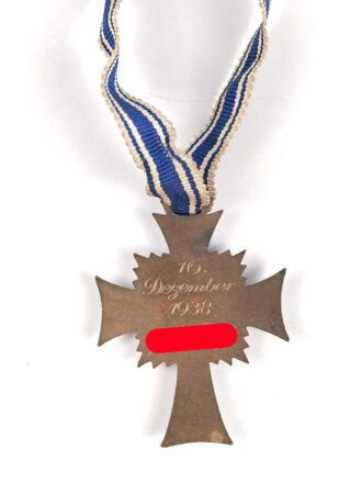 Ehrenkreuz der Deutschen Mutter in bronze,  an langem Band