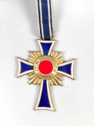 Ehrenkreuz der Deutschen Mutter in gold,  an Bandabschnitt