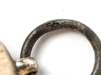 Medaille Winterschlacht im Osten, Hersteller 65 im Bandring für  Klein & Quenzer