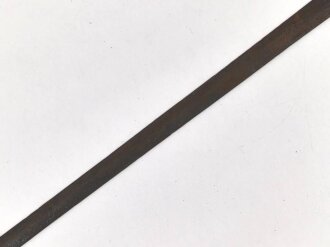 Klinge für eine Blankwaffe, Länge 76,5cm, Gesamtlänge 91cm,  Breite 31mm. Alter und Herkunft unbekannt.