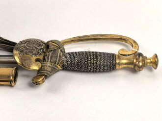 Preußen, Degen für einen Reichsbeamten . Hersteller Eickhorn Solingen, die Scheide im unteren Bereich alt repariert. Mit anhängender Troddel .