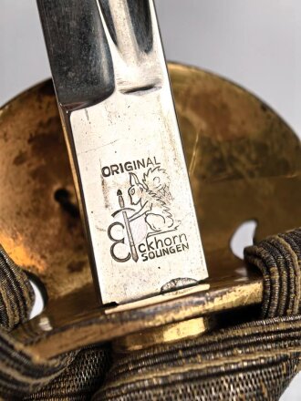 Preußen, Degen für einen Reichsbeamten . Hersteller Eickhorn Solingen, die Scheide im unteren Bereich alt repariert. Mit anhängender Troddel .