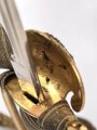 Preußen, Degen für einen Reichsbeamten . Hersteller Eickhorn Solingen, die Scheide im unteren Bereich alt repariert. Mit anhängender Troddel .
