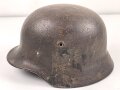 Stahlhelm Glocke Wehrmacht Modell 1940. Narbig mit resten des Originallack, Hersteller nicht lesbar, Glockengrösse 64