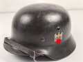 Heer, Stahlhelm Modell 1935. Vorschriftmäßig 1940 neu lackiert und das Wappen entfernt. In allen Teilen originales Stück, guter Zustand. EF66