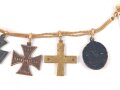 Frackkettchen mit Miniaturen , Eisernes Kreuz 2. Klasse 1914, Braunschweig Kriegsverdienstkreuz, Baltenkreuz, Verwundetenabzeichen schwarz