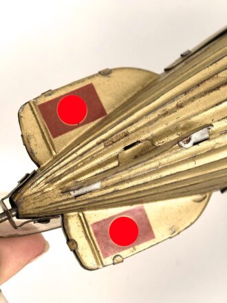 Luftschiff / Zeppelin " LZ 129 Hindenburg" als Kinderspielzeug aus Blech der Firma " Tippco"  Länge 29cm, Original Bemalt, die Luftschraube aus Zelluloid, Funktioniert einwandfrei. Ungereinigtes Stück
