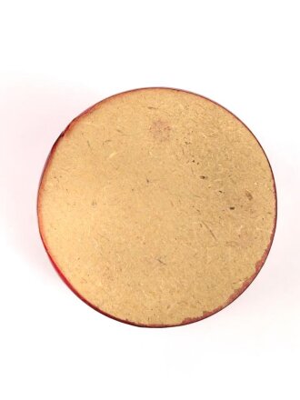 Kerzenhalter aus rotem Chelluloid, Durchmesser oben etwa 6,5cm, schwarzes Hakenkreuz auf weissem Grund.