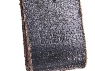 Aufschiebeschlaufe Wehrmacht , datiert 1942. Wurde benutzt um z.B. die Feldflasche ans Koppel zu hängen