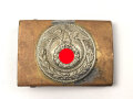 Koppelschloss für Angehörige der SA. Schmale Ausführung 40mm, das Emblem alt wieder aufgelötet, auf der Spitze stehendes Hakenkreuz