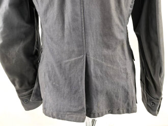 Luftwaffe, blaue Tropenfeldbluse 1. Modell. Kammerstück von 1941. Leicht angeschmutzt, der Brustadler original vernäht, leicht getragenes Stück