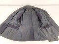 Luftwaffe, blaue Tropenfeldbluse 1. Modell. Kammerstück von 1941. Leicht angeschmutzt, der Brustadler original vernäht, leicht getragenes Stück