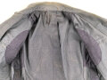 Luftwaffe, blaue Tropenfeldbluse 1. Modell. Kammerstück von 1941. Leicht angeschmutzt, der Brustadler original vernäht, leicht getragenes Stück