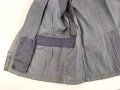 Luftwaffe, blaue Tropenfeldbluse 1. Modell. Kammerstück von 1941. Leicht angeschmutzt, der Brustadler original vernäht, leicht getragenes Stück